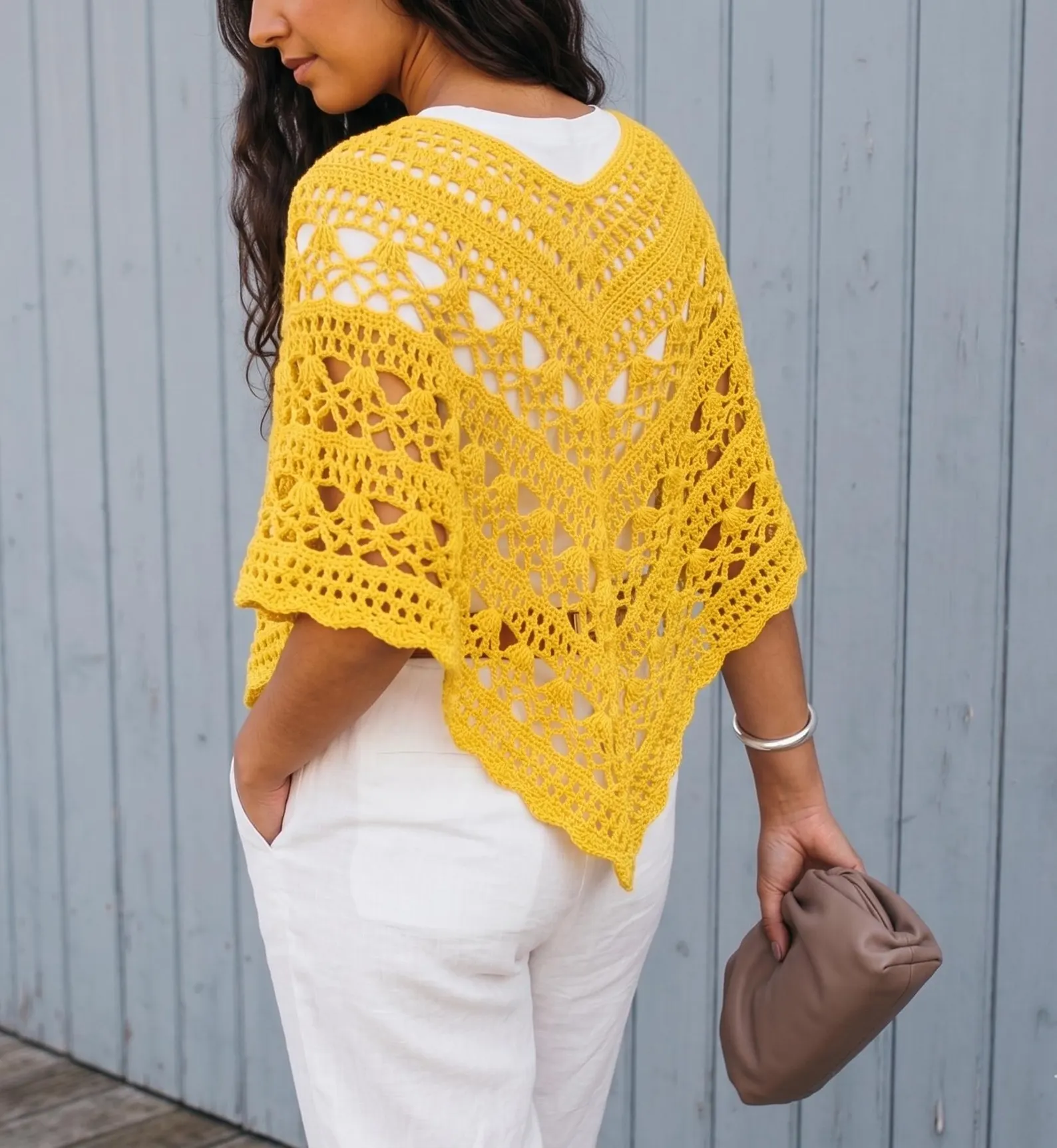 Yellow lace crochet wrap worn over white clothes
